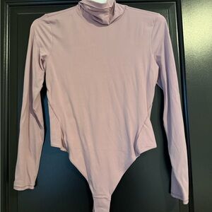 Lululemon Light Pink Long Sleeve Bodysuit